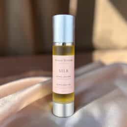 Silk Orange & Bergamot Bath & Body Oil on silk